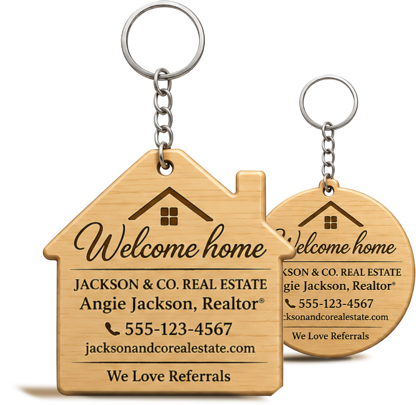 House-shaped and round custom engraved wooden realtor keychains with personalized real estate branding, silver keychain hardware, and Welcome Home design for client closing gifts.